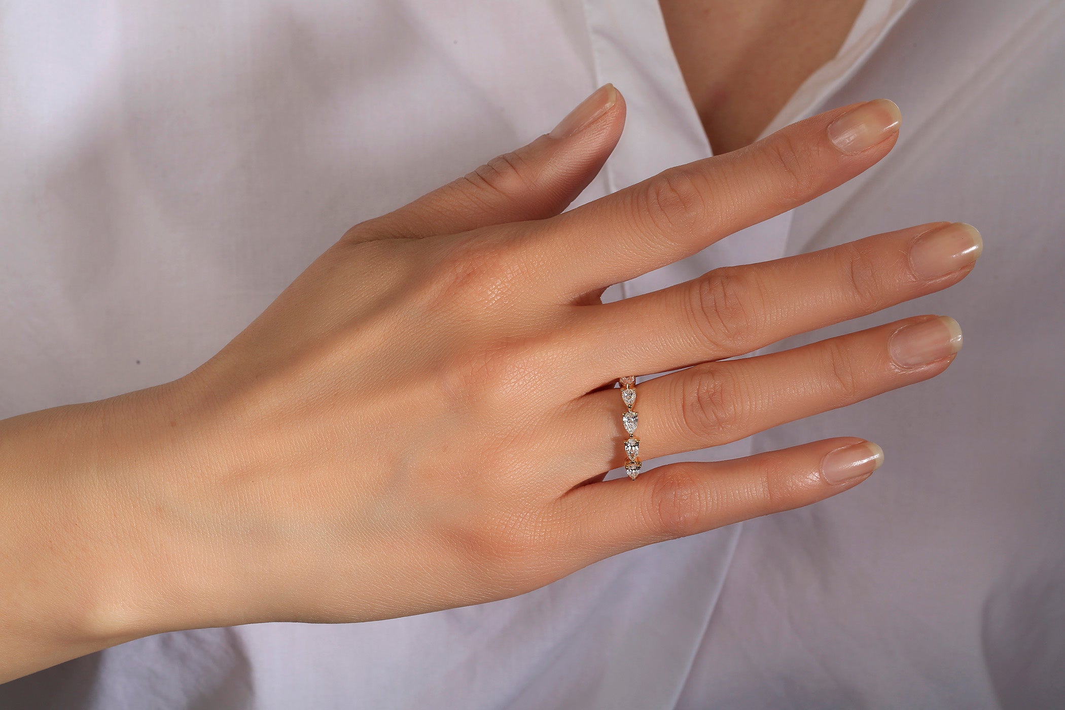 Mesmerizing Pear-Shape Diamond Band