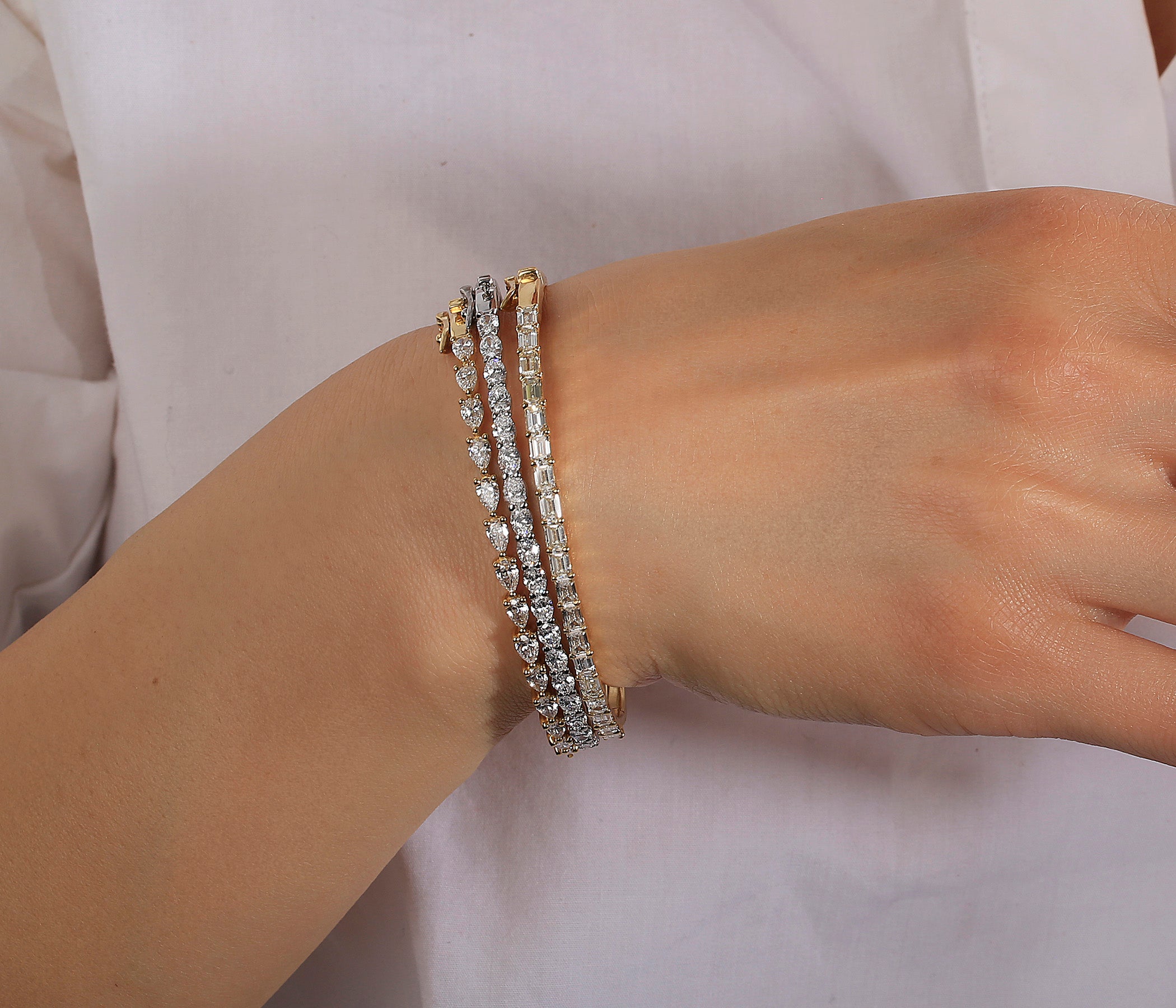 Pulse-Raising Pear-Shape Diamond Bangle